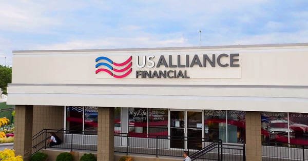 Exterior view of a USALLIANCE Financial branch with the credit union's logo and signage prominently displayed