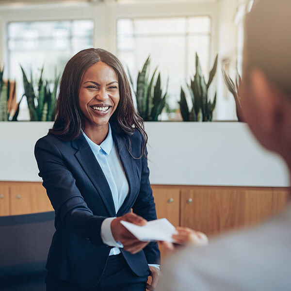 A woman shaking hands.